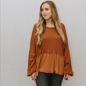 Orange oversized long sleeve top